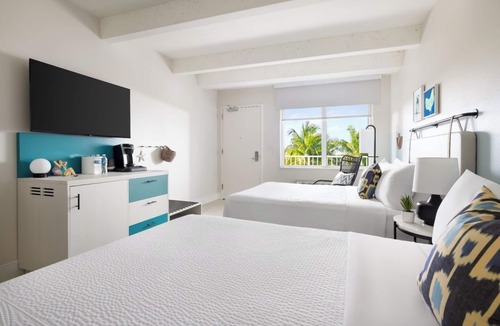 New Town Hotel | Key West Cool | Chill Days, Fun Nights, Poolside Drinks & Lawn Games