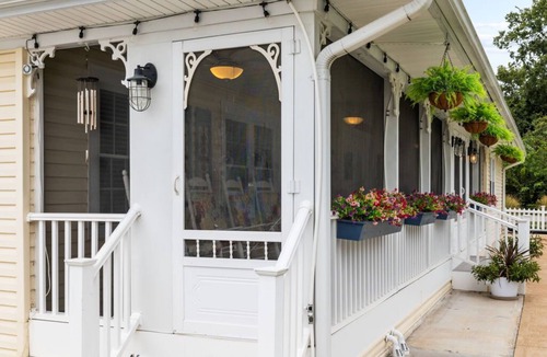 Kimmswick House | Kimmswick Porch Haven: Hot Tub, Cozy Fire Pit, & Fenced Yard!