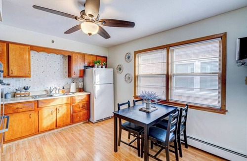 Elmwood Park Condo | King Bed 2BR Sleeps 13 Historic Location