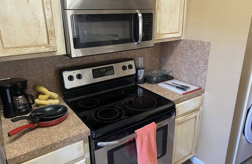 Beaumont Condo | KING Bed, Pool, TV Sports Pack, WiFi, Washer and Dryer in Unit!