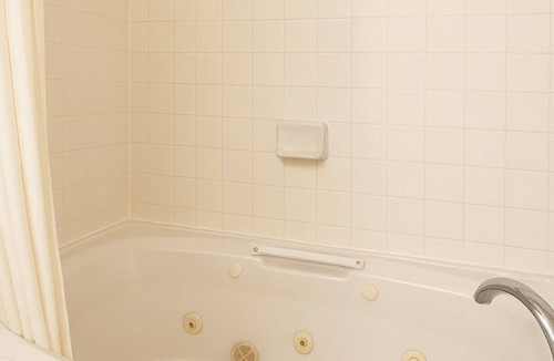 Point Edward Hotel | King Bed Suite with Jetted Tub