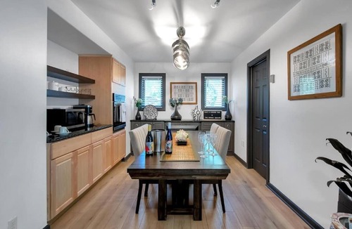 Wichita House | King Estate with attached Mid-Century Apartment & Gym.