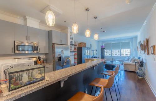 Hackensack River Waterfront House | King Master and Plush Queen near NYC w kitchen, living room plus on-site gym