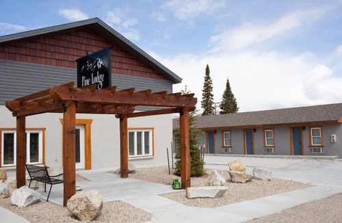 Encampment Apartment | King Room Retreat: Rustic Escape by Platte River
