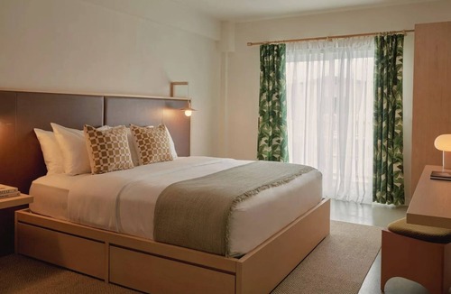 San Jacinto Hotel | King Room w/Balcony Overlooking Courtyard Pool + Rooftop Bar