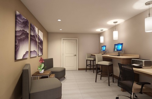 Sterling Heights Condo | King Suite | Free Breakfast, Pool & Gym Access!
