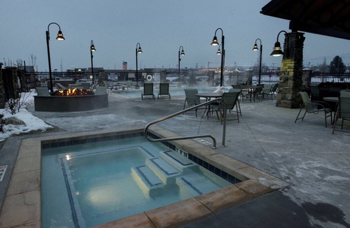 Midvale Apartment | King Suite | Heated Pool & Hot Tub. Free Breakfast Buffet. Near Jordan Landing!