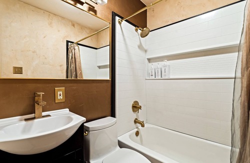 Taos House | King Suite, kitchenette, private fenced patio with shared laundry and sauna on site.