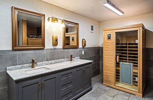 Taos House | King Suite, kitchenette, private fenced patio with shared laundry and sauna on site.