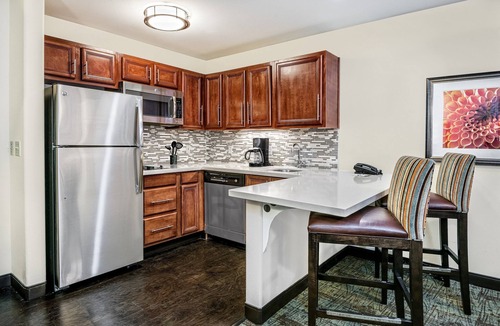 Tech Terrace Condo | King Suite. Shared Pool & Hot Tub. Free Breakfast. Near Texas Tech University & University Medical Center.