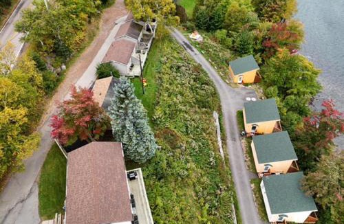 Ingonish Beach Ski Chalet | Knotty Pine Cottages, Suites & Motel Rooms