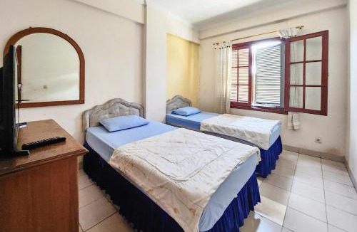 Carita Hotel | Kondominium Pantai Carita SJ RedPartner