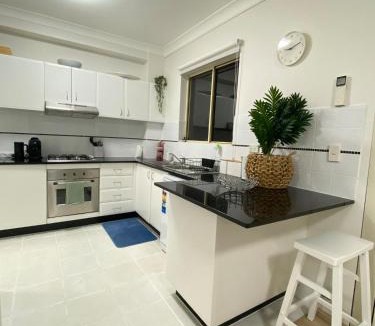Homebush West Apartment | KozyGuru | Homebush West | 3-Beds Apt with Parking