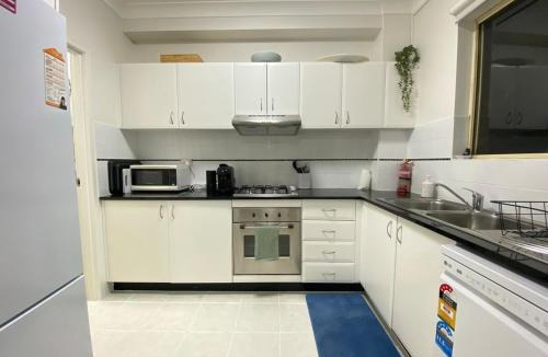 Homebush West Apartment | KozyGuru | Homebush West | 3-Beds Apt with Parking
