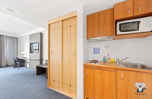 Parramatta Apartment | KozyGuru | Parramatta Studio Steps to Shops, Cafés