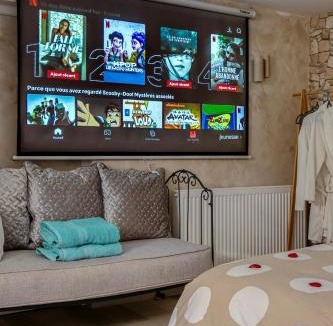 Tournedos-Bois-Hubert Apartment | L'Escapade Enchantée - Spa, Cheminée et Cinéma