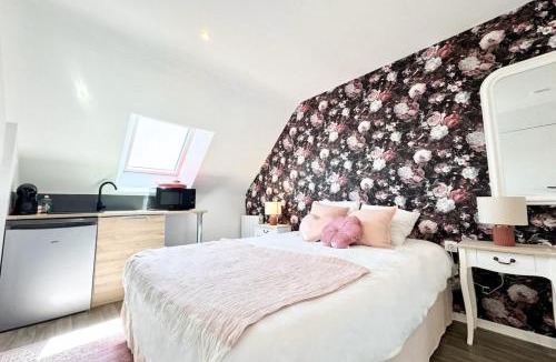 Queven Apartment | L’instant rose - Cocon fleuri avec jacuzzi