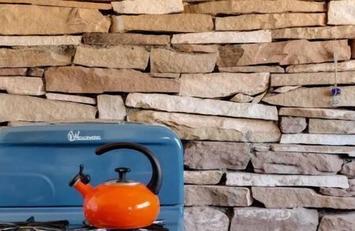 Abiquiu House | La Biblioteca: Eclectic Cottage in OKeeffe Country