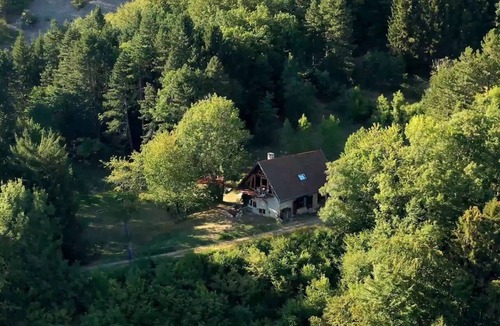 Quaix-en-Chartreuse House | La Canopée de Chartreuse, a home with a terrace perched in a tree