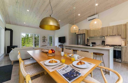 Baie-St-Paul Ski Chalet | La Charlebois 24: Forest Views, Hot Tub & Patio