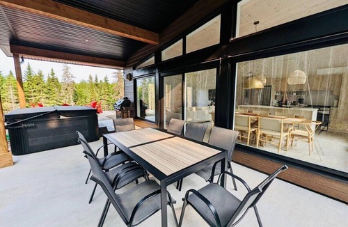 Baie-St-Paul Ski Chalet | La Charlebois 24: Forest Views, Hot Tub & Patio