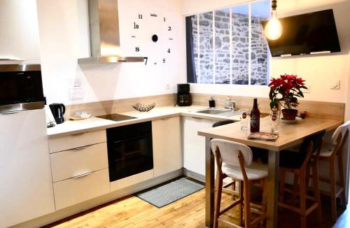 Centre ville - Urbanistes Apartment | La chouette détente, appartement jacuzzi fougères