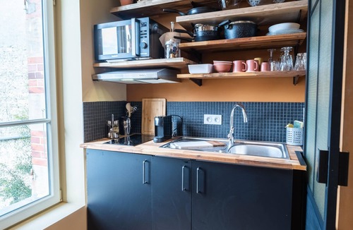 Bayeux Apartment | La cour de Philomène-Studio-Apartment-Private Bathroom-Courtyard view