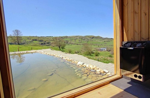 Segur-les-Villas Cabin | La Feuille Deluxe Log Cabin