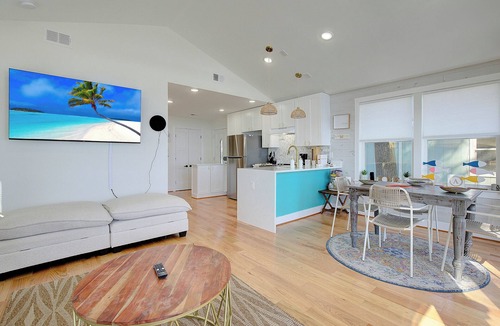 North Beach House | "La Licorne" Waterfront Beach Cottage