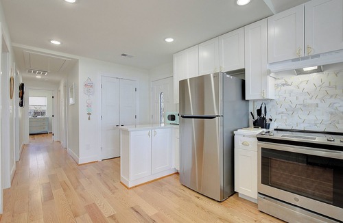 North Beach House | "La Licorne" Waterfront Beach Cottage