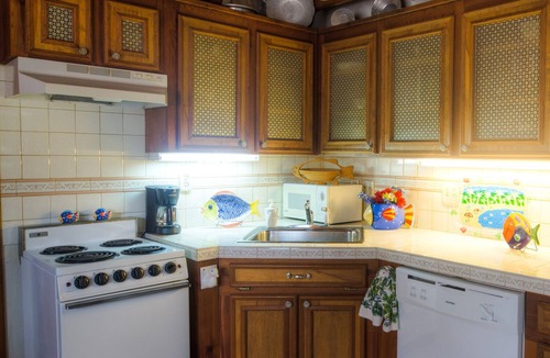 Bacliff Cottage | La Petit Maison, is a waterfront two-story cottage near Kemah,TX