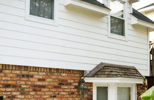 Bacliff Cottage | La Petit Maison, is a waterfront two-story cottage near Kemah,TX