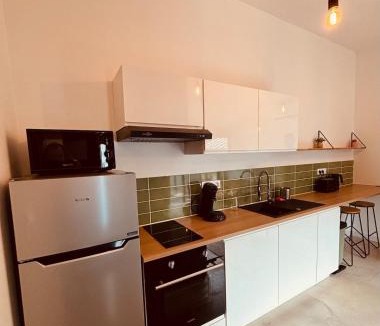 Escoville House | La vague verte