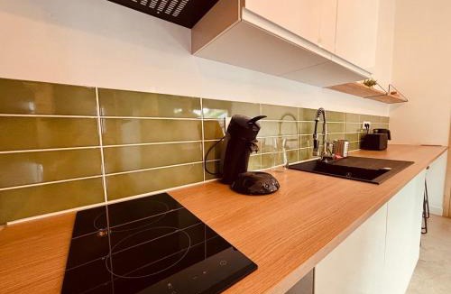 Escoville House | La vague verte