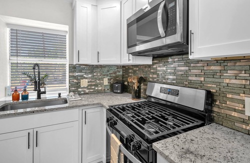 Southside House | Lackland AFB Luxury - Sleeps 15 · Games · Big Yard