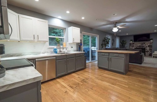 East Stroudsburg House | Lake Adjacent Home w/Hot Tub, Game Room, Boats, Fenced Yard