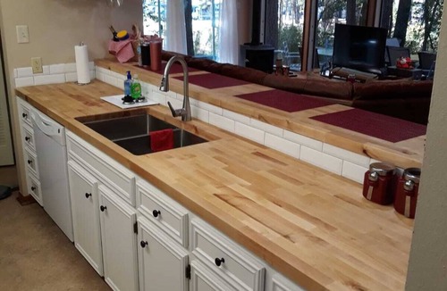 Cape Royale House | Lake and marina view, Cape Royale under the trees, newly remodeled kitchen