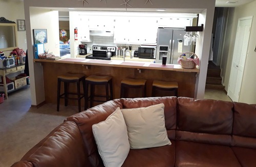 Cape Royale House | Lake and marina view, Cape Royale under the trees, newly remodeled kitchen