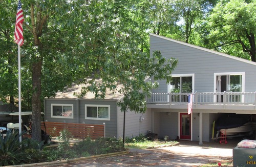 Cape Royale House | Lake and marina view, Cape Royale under the trees, newly remodeled kitchen