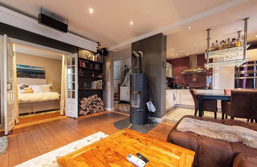 Huenibach Villa | Lake and Mountain View Villa with Hot Tub & Garden