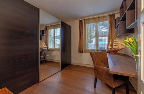 Huenibach Villa | Lake and Mountain View Villa with Hot Tub & Garden