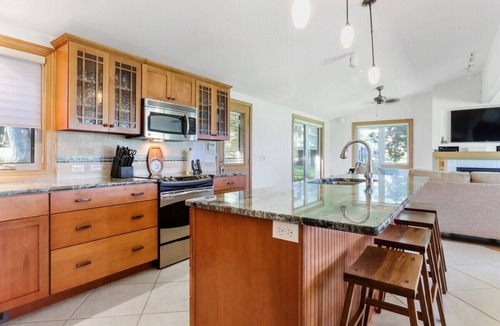 Powers Lake House | Lake Benedict Lakefront Home with Fire Pit Large Yard Kayak Friendly