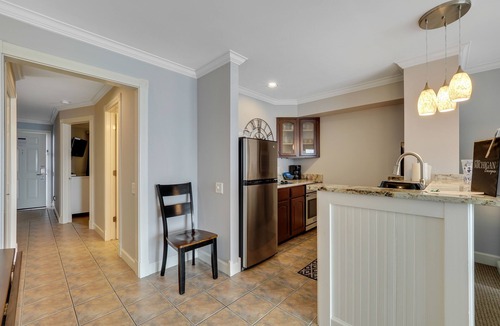 Boyne City Condo | Lake Charlevoix Views from Above | Private Balcony + Beach Access | Fireplace