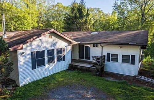 Greeley House | lake/fireplace