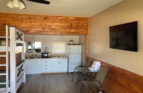 Graham Cabin | Lake front Cabin #11 with Porch - Cabin with kitchen, steps from Possum Kingdom Lake