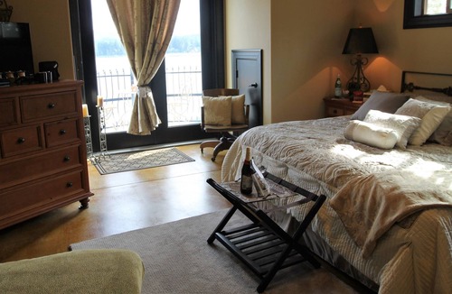 McKenna Bed & Breakfast | Lake Front Castle Style Custom Home Balcony Suites