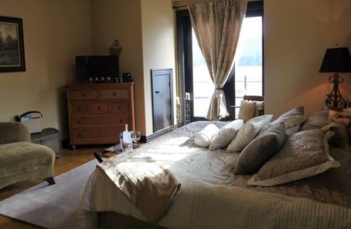 McKenna Apartment | Lake Front Castle Style Custom Home Balcony Suite