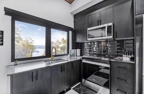 Penetanguishene Apartment | Lake Front Family Getaway - Sandy Beach!