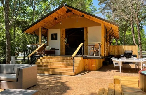 Bastrop Cabin | Lake front glamping cabin. Bathroom inside.