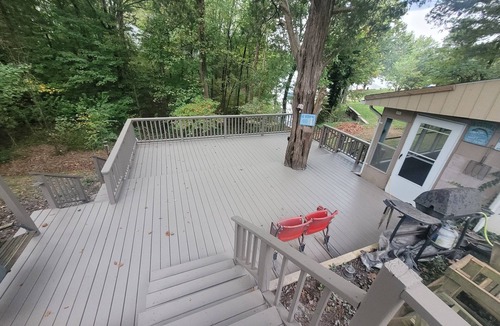 Wolf Creek House | Lake Front. Large shaded deck with Covered Dock access. Fire pit.